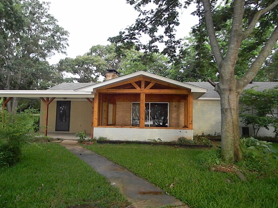 Residential porch addition with cedar framing — East Texas